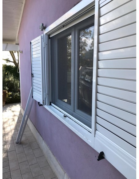 Zanzariera verticale a molla con... Zanzariera verticale a molla con...