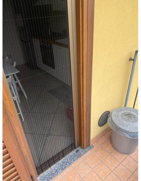 Zanzariera orizzontale plissettata... Zanzariera orizzontale plissettata...