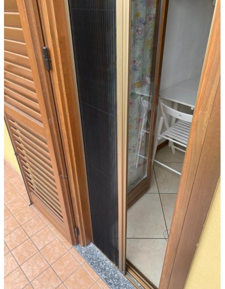 Zanzariera orizzontale plissettata... Zanzariera orizzontale plissettata...